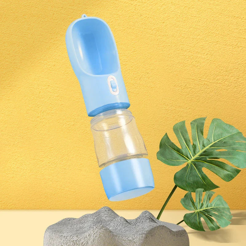 Portable pet water bottle with food bowl, perfect for outdoor adventures with your furry friend.