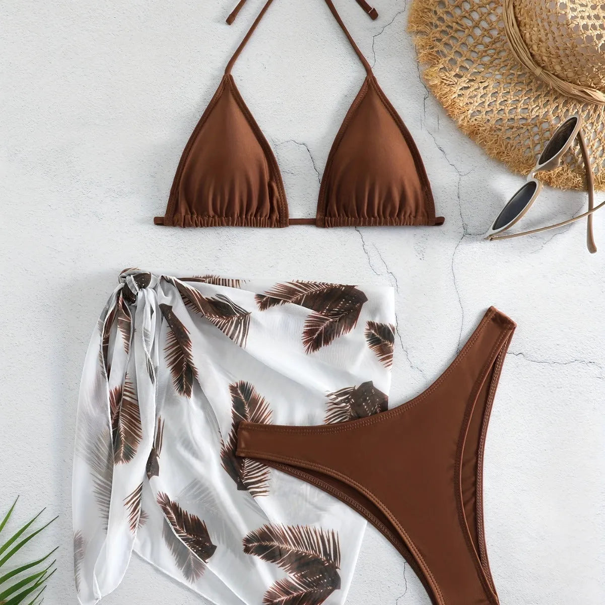 Women's three-piece bikini swimsuit set with solid colour swimwear and printed gauze skirt
