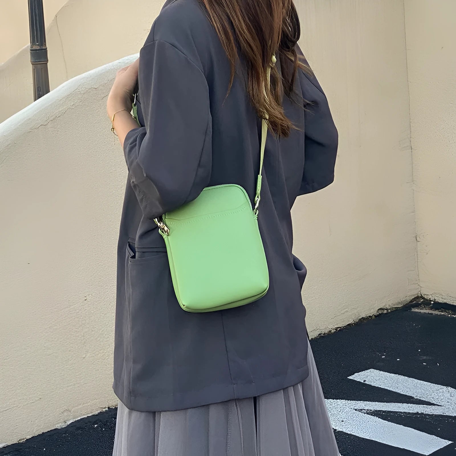 Solid colour PU leather crossbody phone bag in beige, shown with strap.