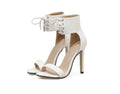 Python pattern straps sandals for women, flat heel, artificial PU upper, rubber sole, black colour, open toe