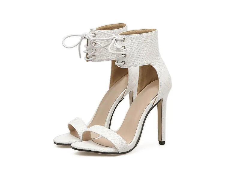 Python pattern straps sandals for women, flat heel, artificial PU upper, rubber sole, black colour, open toe