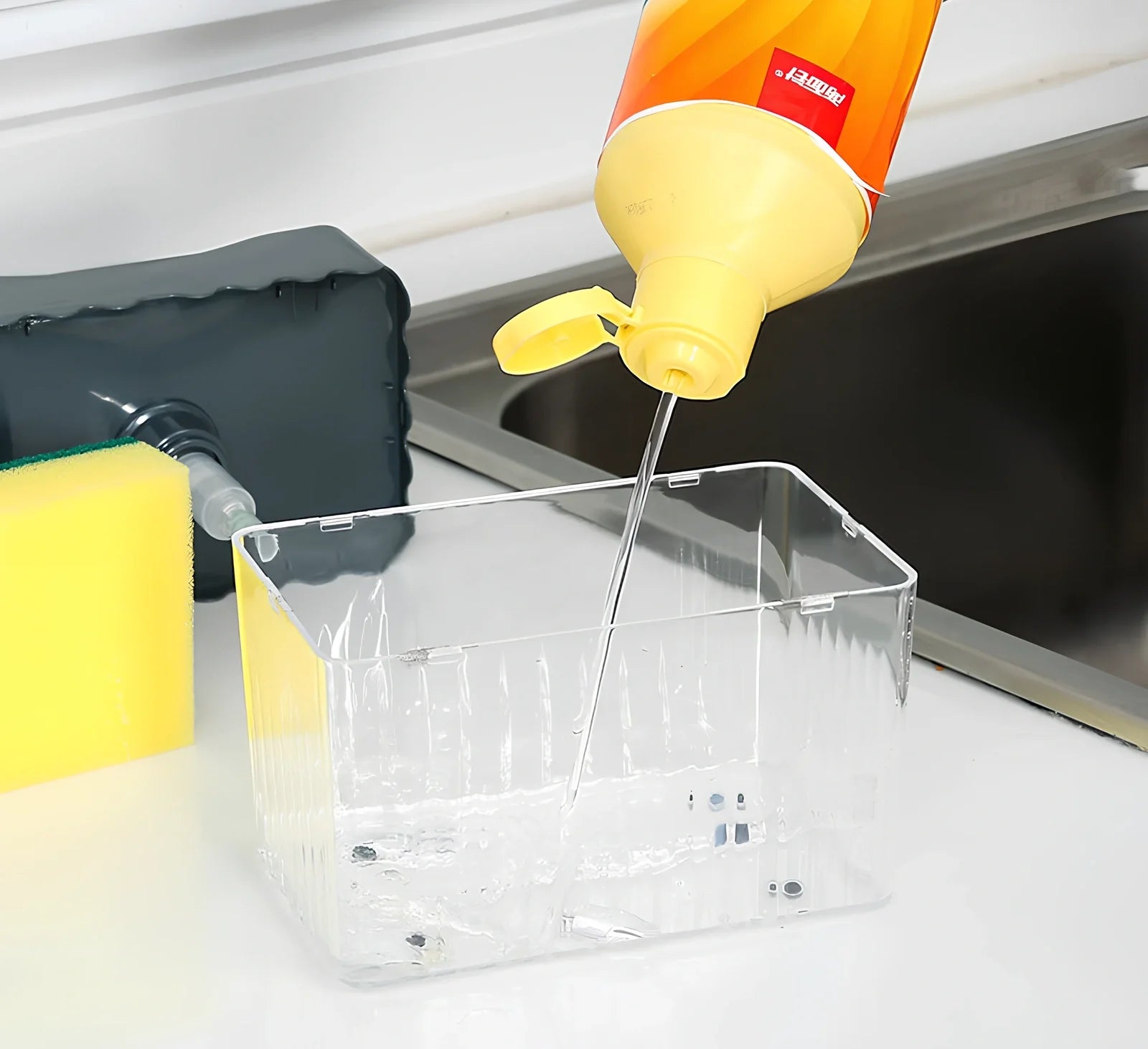 Dark blue 2-in-1 soap dispenser and sponge caddy unit on kitchen counter with measuring tape showing 13.5cm diameter