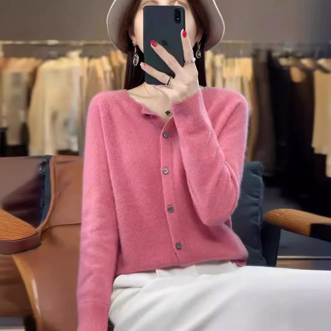 Women's merino wool cardigan in various colours, featuring an O-neck and long sleeves