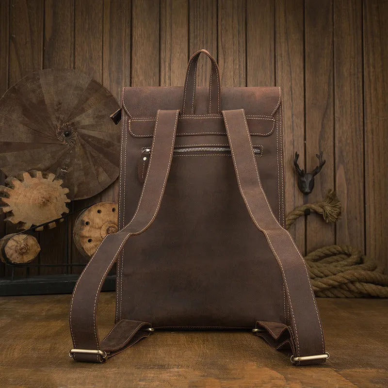 Dark brown genuine leather men's travel bag with retro style, showing three-dimensional pockets and shoulder straps.