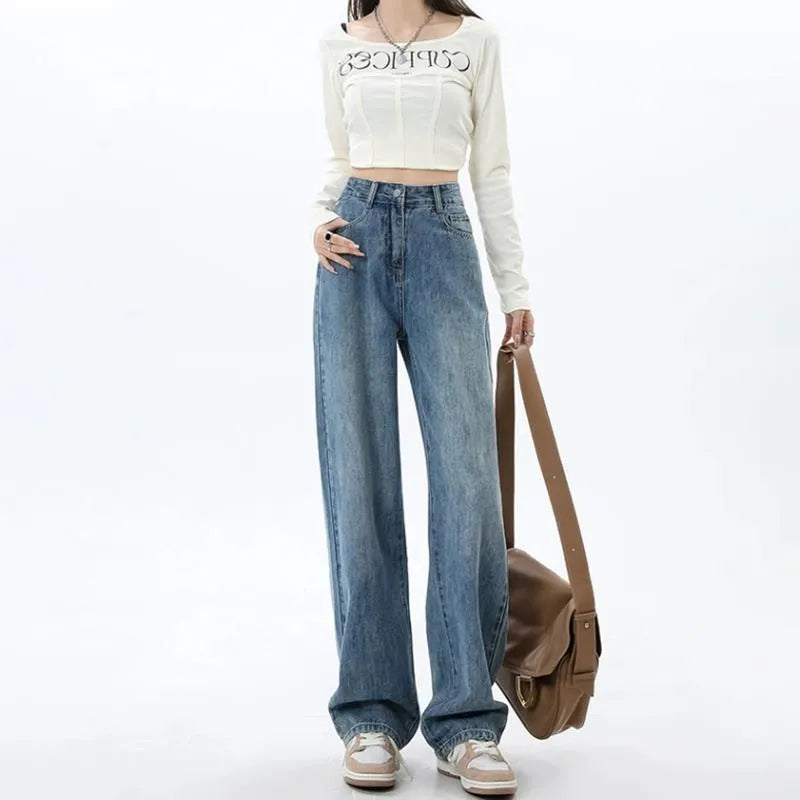 Woman wearing retro blue high waist wide leg jeans with a straight cut