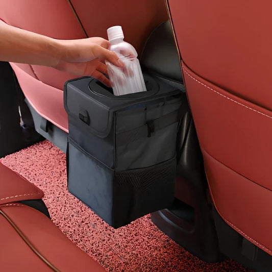 Black oxford cloth hanging car trash can with adjustable strap, waterproof lining, and mesh pockets, dimensions 16.5cm x 15cm x 25cm