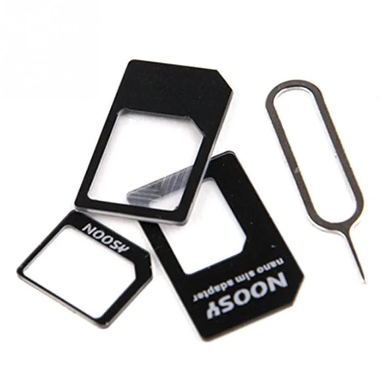 Three black and white plastic SIM card holders for memory chip storage.