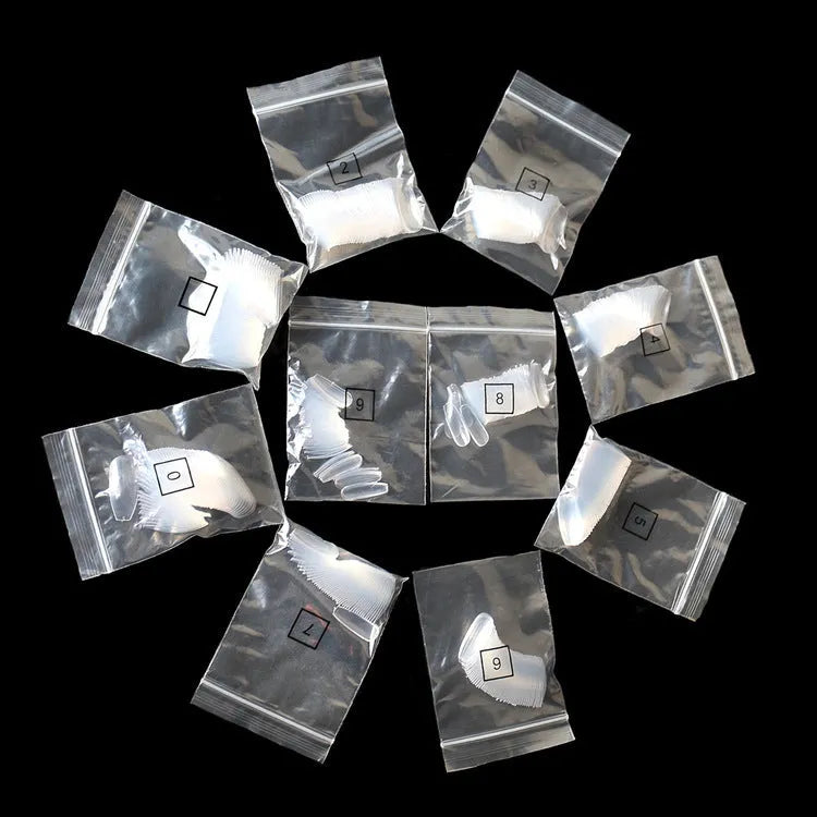 500 clear and natural ABS false nails in ten sizes packed in bags