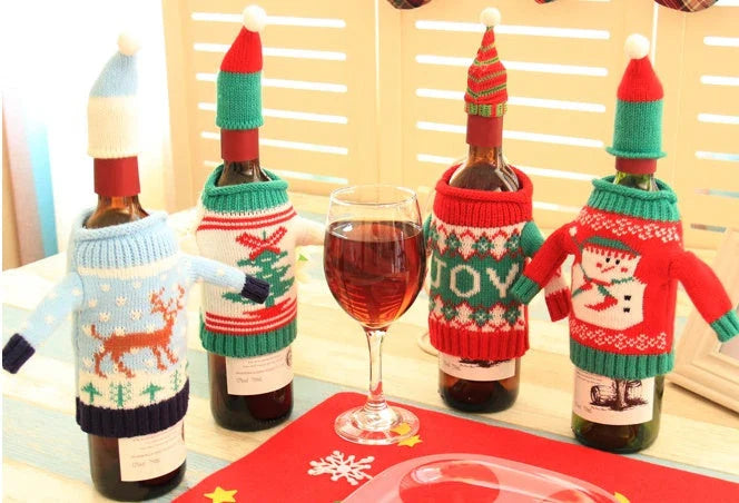 Knitted Christmas Bottle Set with festive designs including Joy, Christmas tree, elk, and snowman