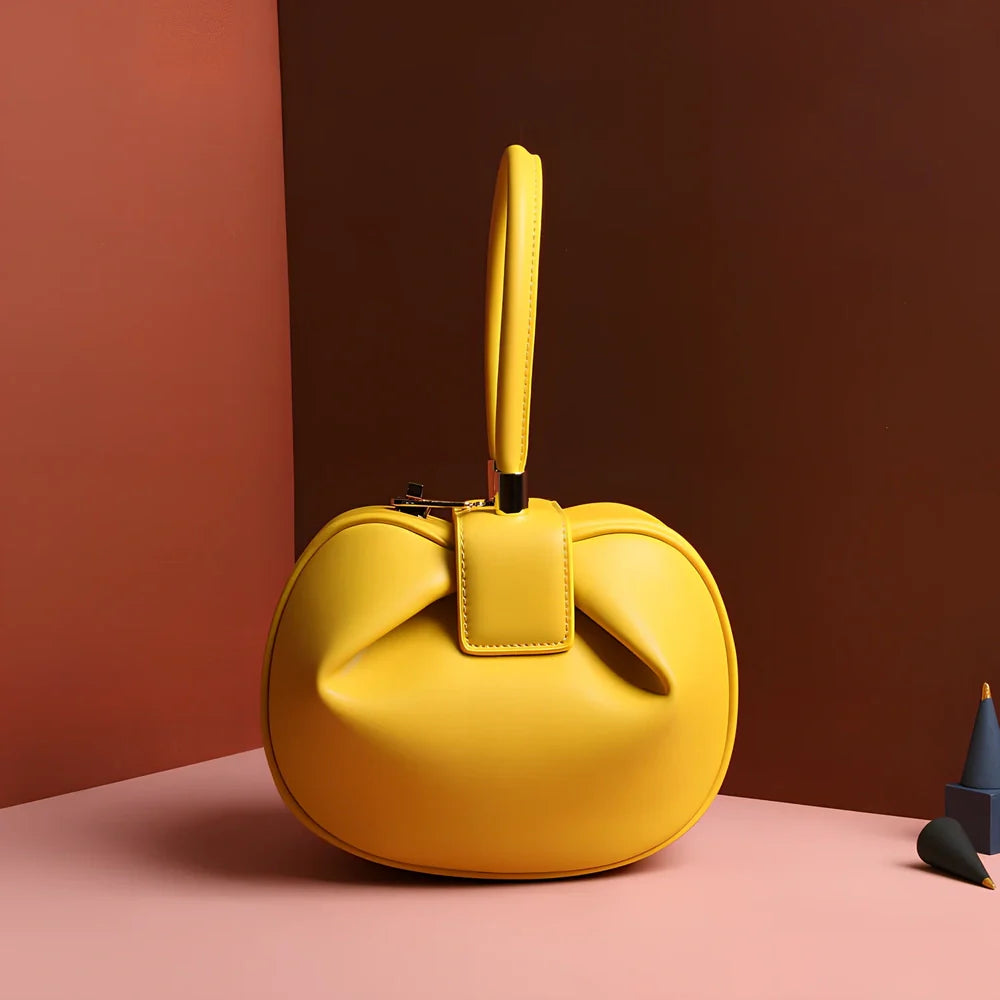 Women's cowhide leather tote bag in tramp shape with single handle and buckle, available in apricot, black, and other colours, big size 35cm x 40cm