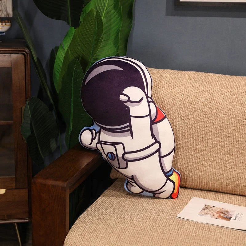 Cozy space-themed plush pillow with astronaut, rocket, and spacecraft motifs for kids