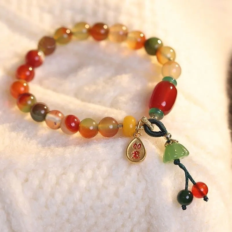 Handmade mixed material bracelet featuring a Lotus and Ruyi charm design, M990 style.