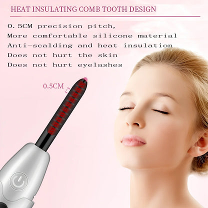 Pink USB-charged electric eyelash curler with curved brush head and LED indicator