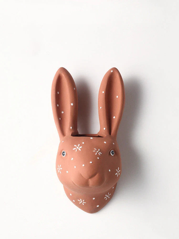 Ceramic animal-shaped wall vases in rabbit, brown bear, and giraffe designs for stylish home decor