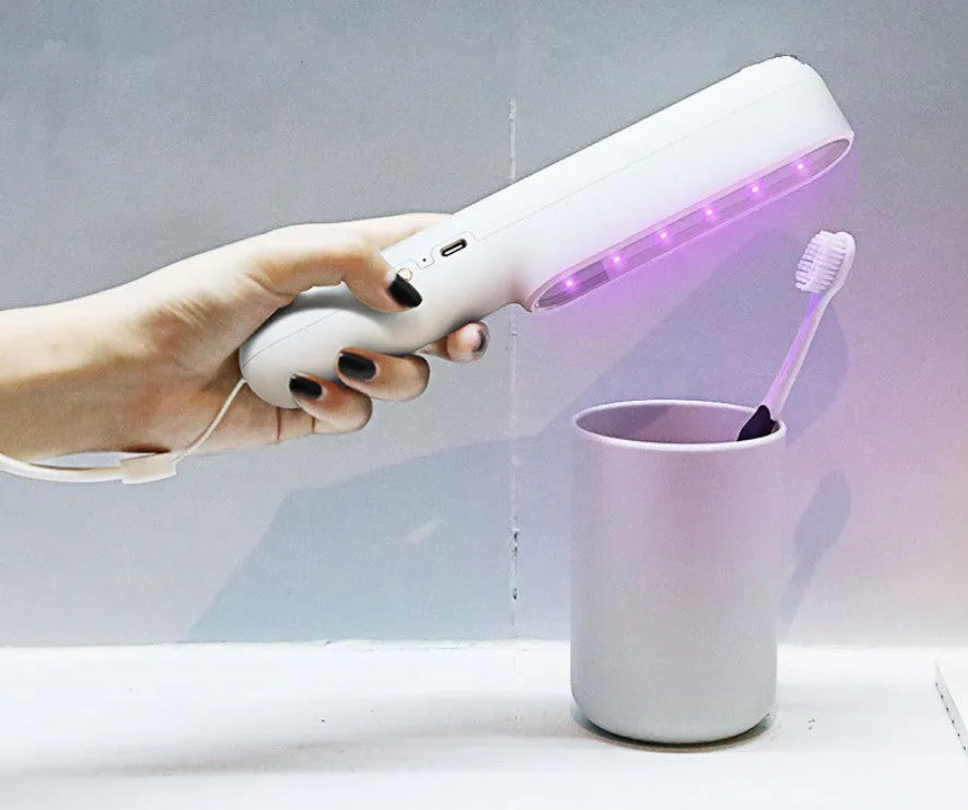 Portable UV hand-held sterilisation lamp in white, 219x34x40mm rechargeable design