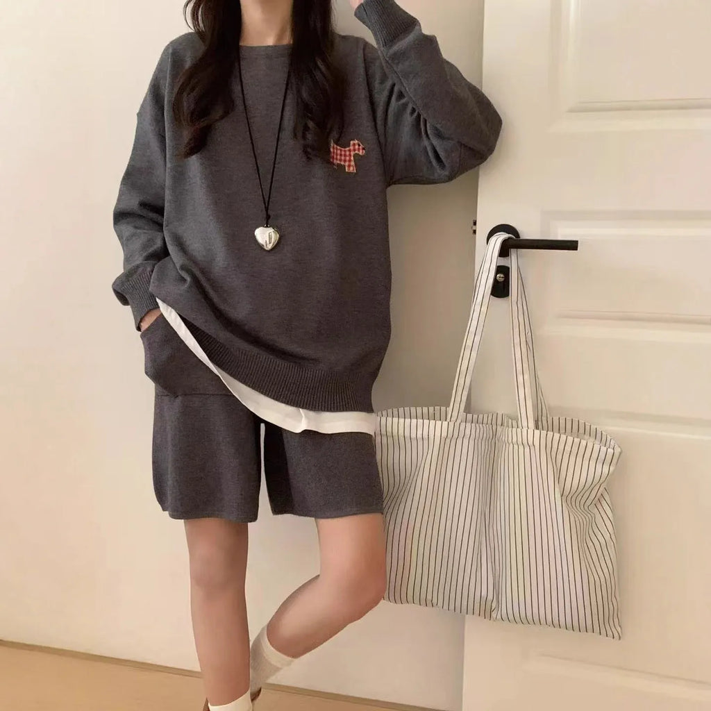 Women's knitted sweater and shorts suit in imitation cashmere with animal embroidery, shown in milk blue.