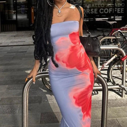 Chic slit maxi dress in various vibrant colors, featuring a high-waisted silhouette and flirty slit detail for a flattering and stylish summer look.