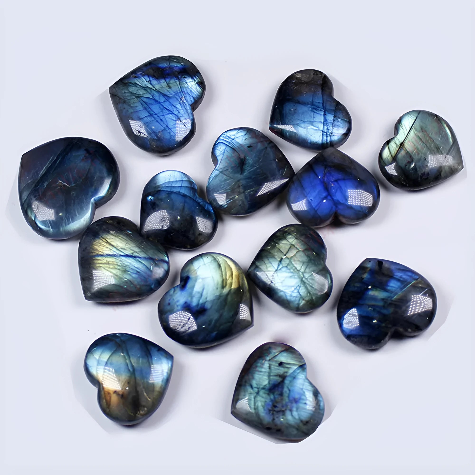 Natural blue pulled feldspar heart pendant with a handle detail on a white background.