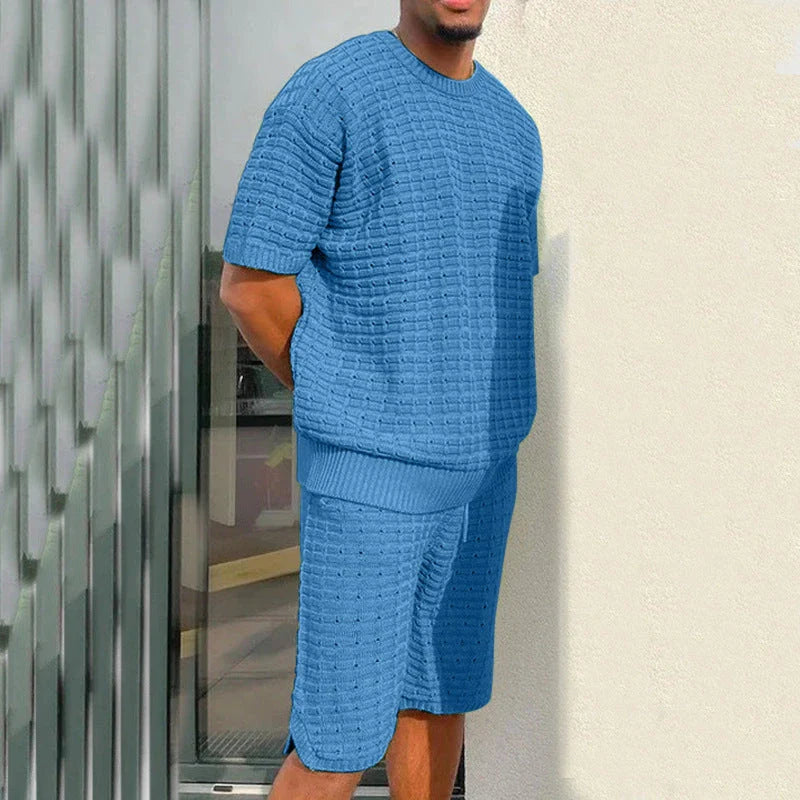 Men's casual summer outfit featuring a loose-fitting polyester shirt and matching shorts in various colors