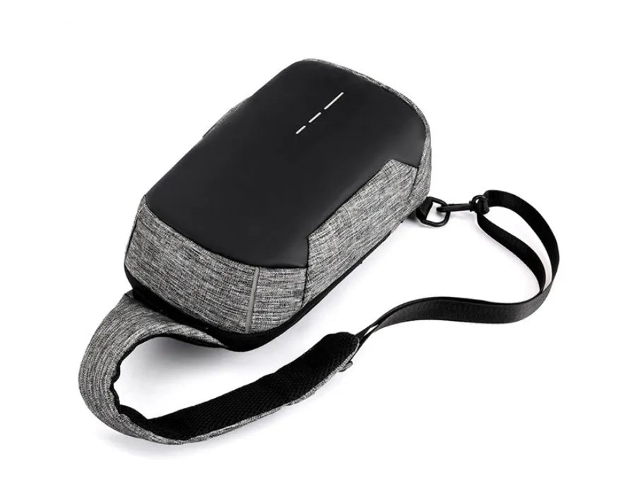 Dark blue waterproof oxford cloth chest bag with a single strap and front zipper.