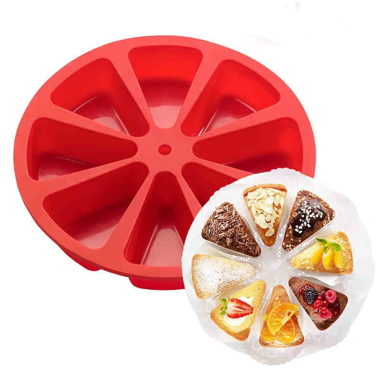 Green silicone cake mold 7 x 4.5cm on a baking tray with a small cupcake inside
