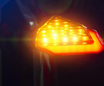 L16 Beast Spirit LED turn signal light in yellow with hook-shaped DRL, plastic and acrylic construction
