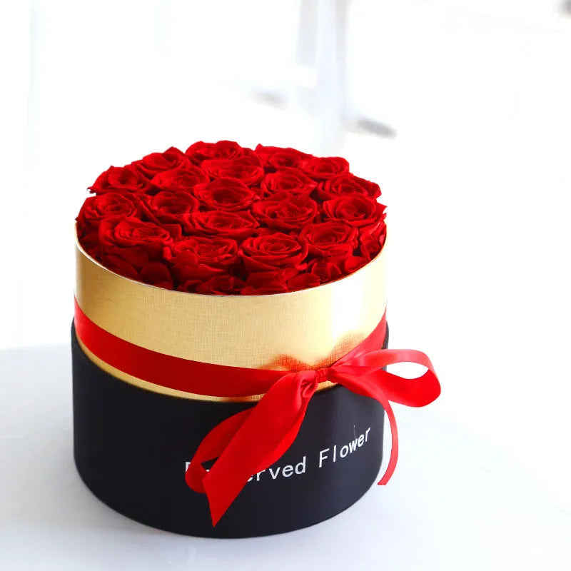 Eternal preserved real roses arranged in a decorative presentation gift box.