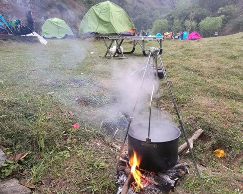 Silver aluminium camping tripod with hanging chain for outdoor barbecue cooking