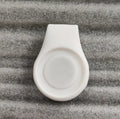 Set of 10 silicone golf hat clip ball marker holders in assorted colours attached to a hat brim