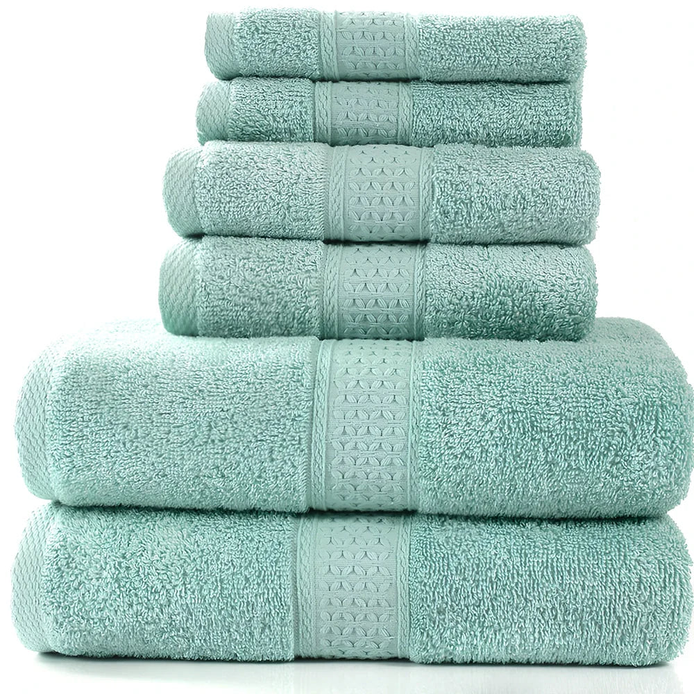 Pure cotton absorbent towel set in bamboo green, showing 140x70cm bath, 33x73cm hand, and 33x33cm square towels