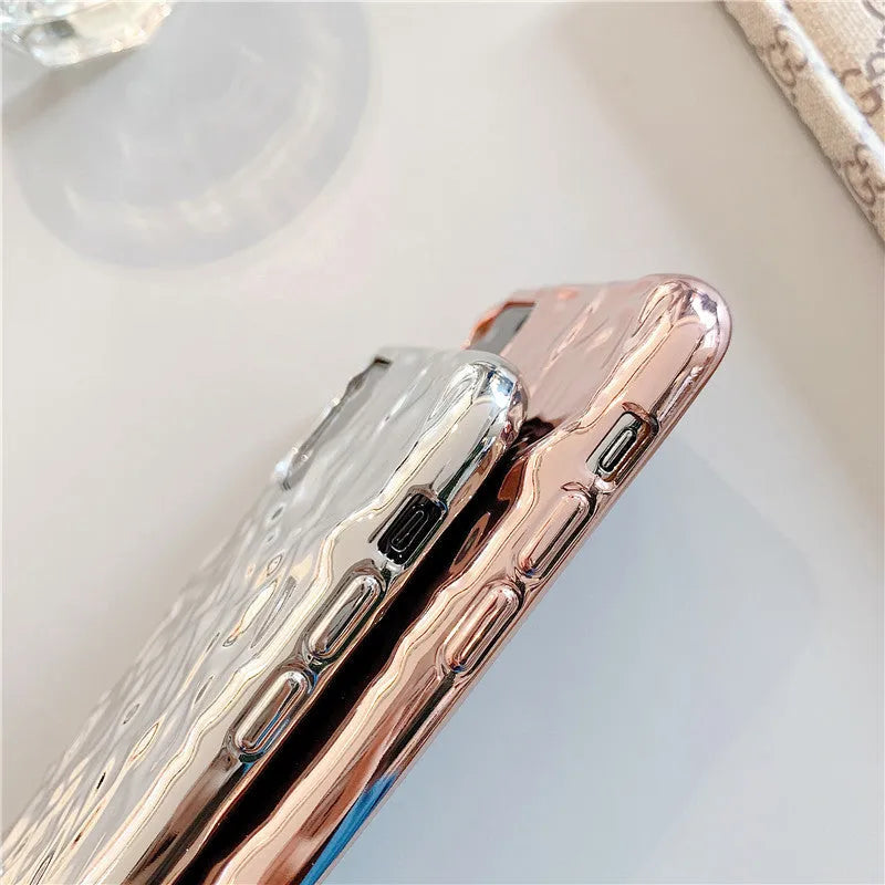 Clear electroplated rose gold iPhone back cover case on an iPhone 15 Pro Max.
