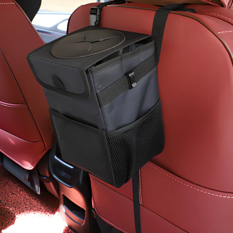Black oxford cloth hanging car trash can with adjustable strap, waterproof lining, and mesh pockets, dimensions 16.5cm x 15cm x 25cm
