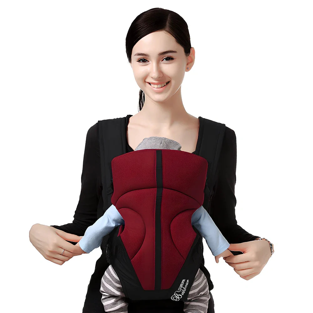 Beige baby strap carrier with adjustable straps supporting 15kg in multiple positions including chest and back for infants 3-18 months