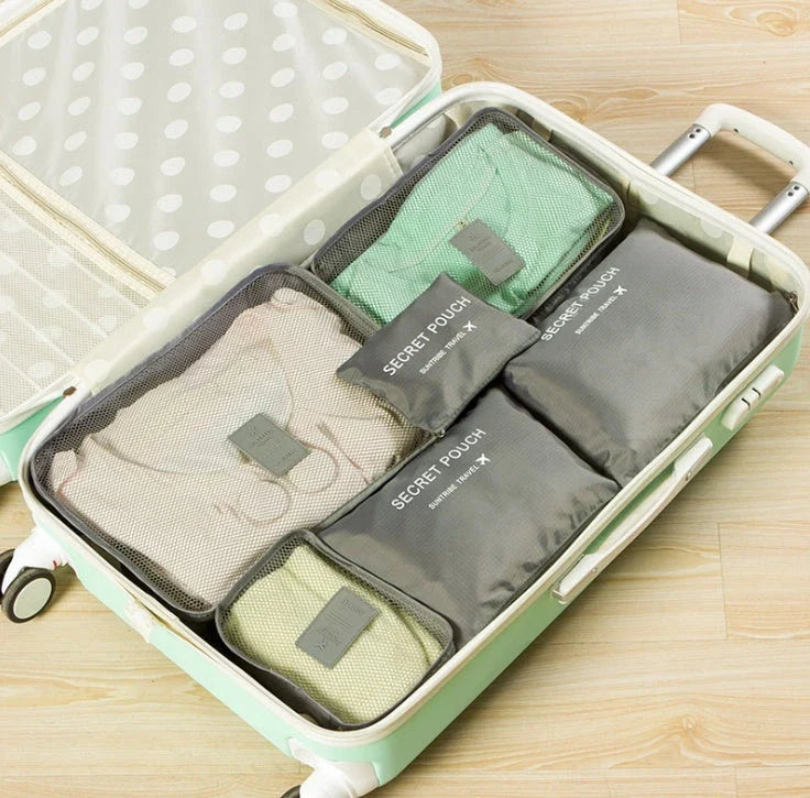 Durable waterproof packing cubes in various colors for organized, efficient travel