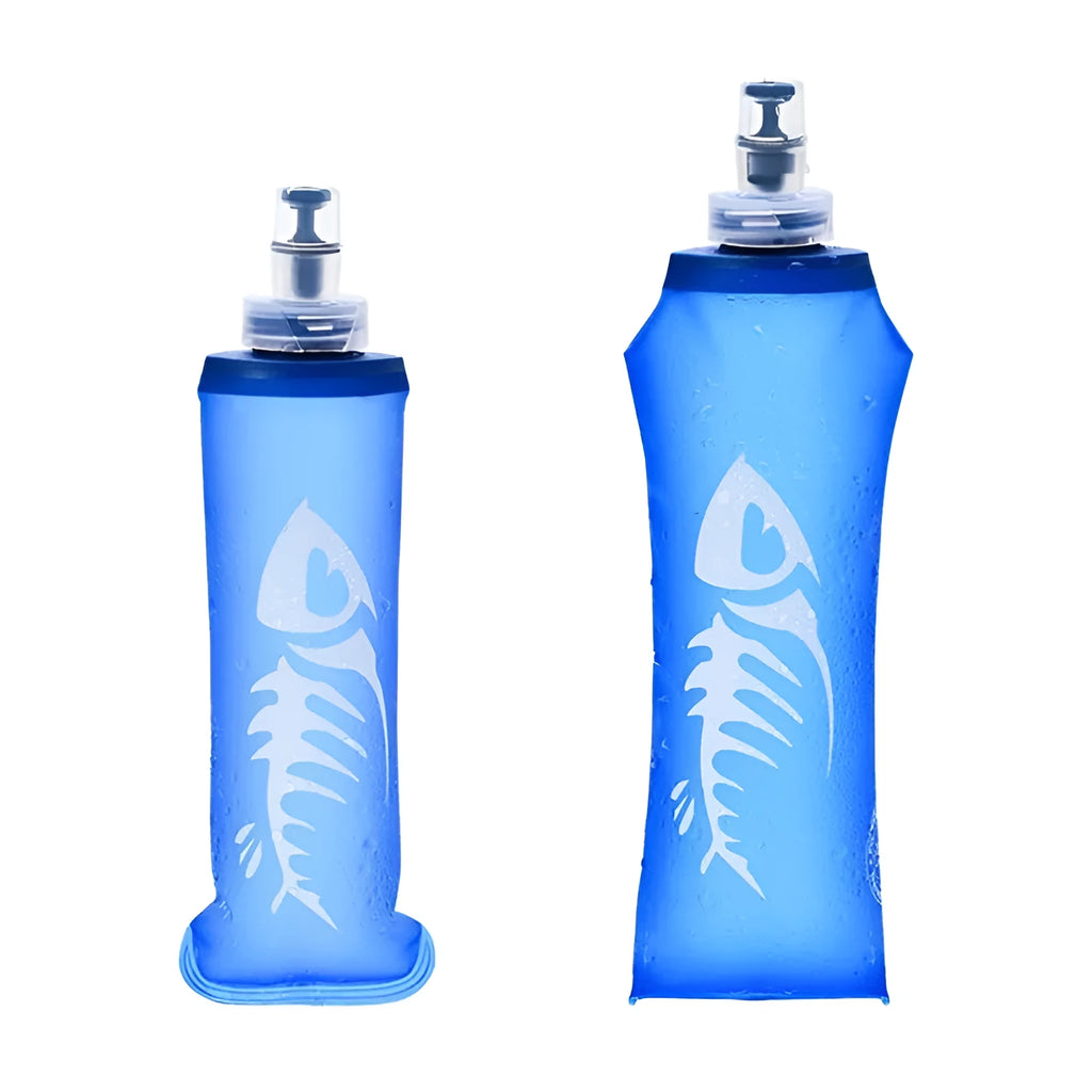 Blue sports soft water bottle with silicone lid on outdoor ground