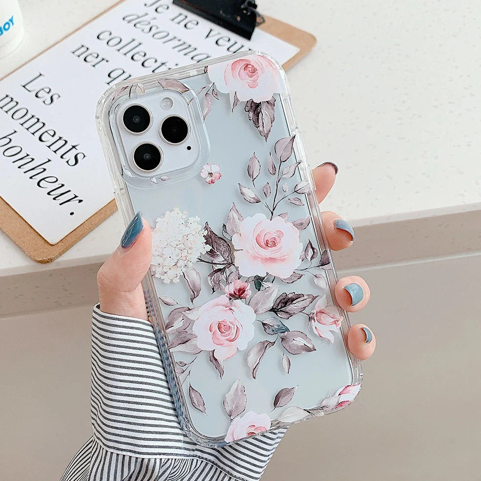 Orange silicone iPhone case with banana leaf watercolour pattern and electroplated camera cutout