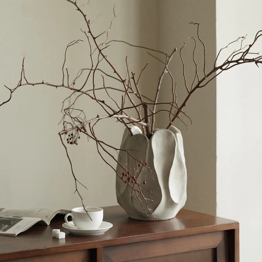 Handmade irregular ceramic vase in natural magnesium clay colour for flower arrangements