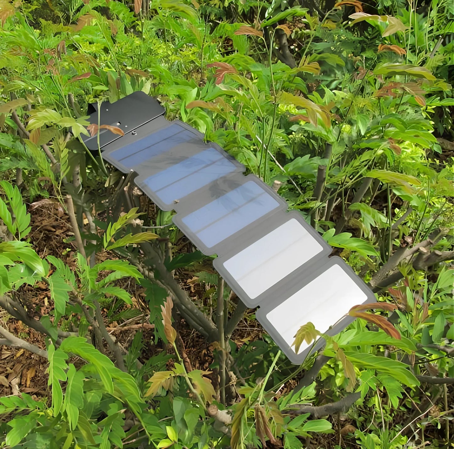 8W folding solar charger with expanded monocrystalline panel showing USB output port