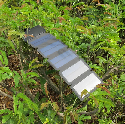 8W folding solar charger with expanded monocrystalline panel showing USB output port