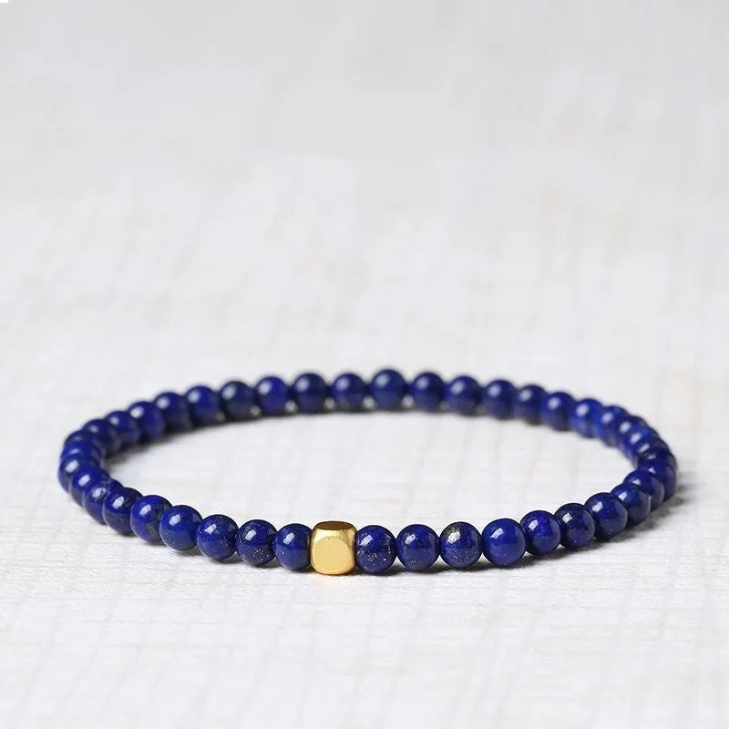 Natural crystal green and gold stone geometric bracelet with 16mm bead and electroplated finish.