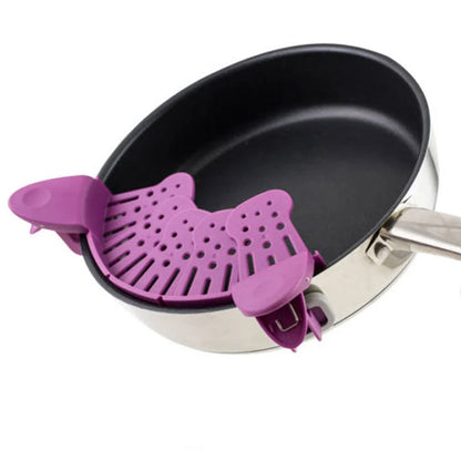 Universal Silicone Clip-on Pan Pot Strainer in purple and green, showcasing its compact design and secure clips
