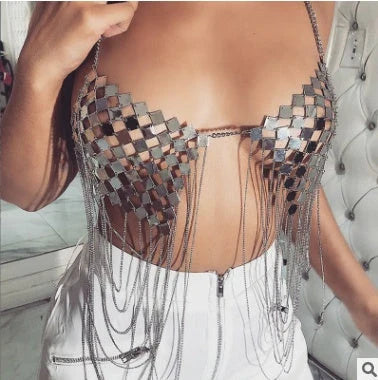 Women's golden and silver metal bra chain with tassel detail, adjustable for a perfect fit