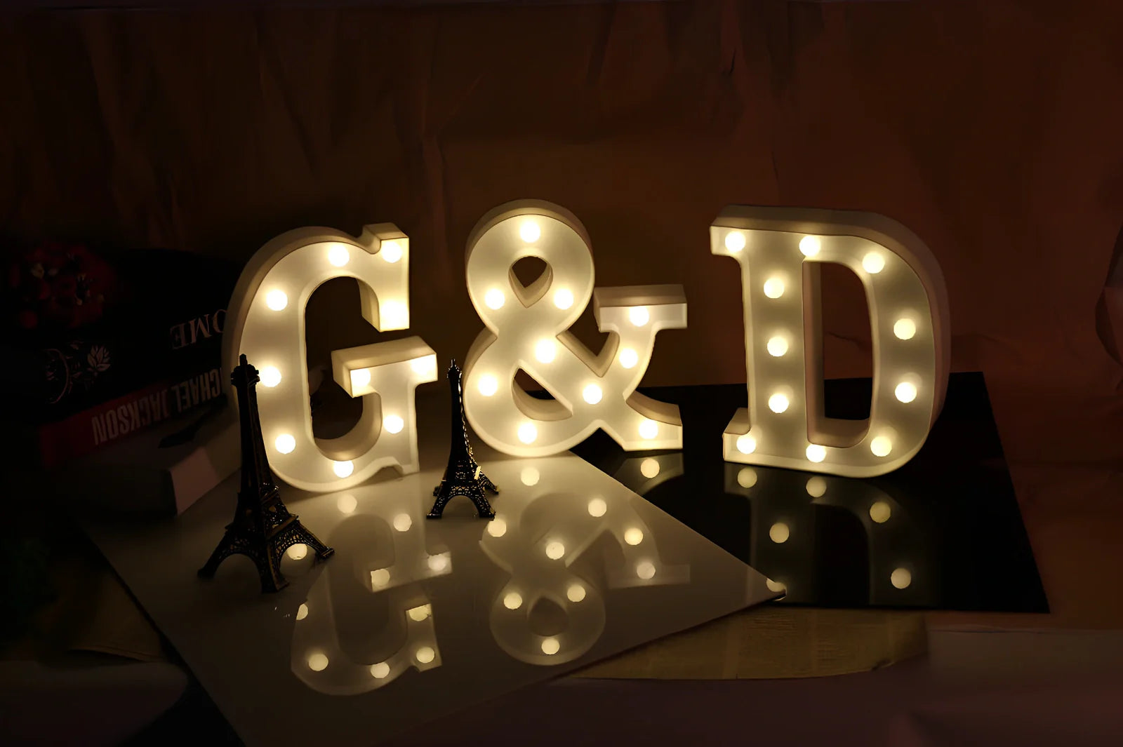White plastic LED alphabet marquee sign with warm white illumination, 22cm height with battery operation