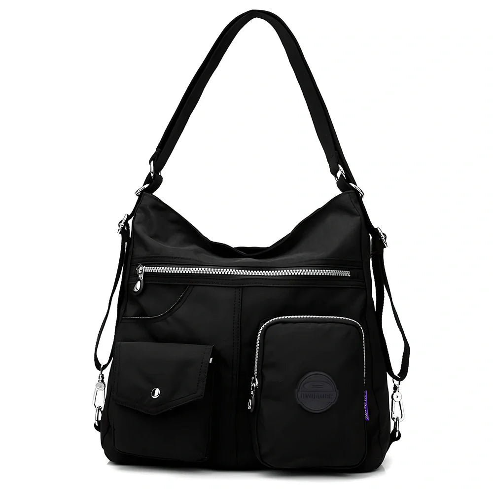 Women's waterproof nylon crossbody bag with organizational pockets and 34cm laptop capacity