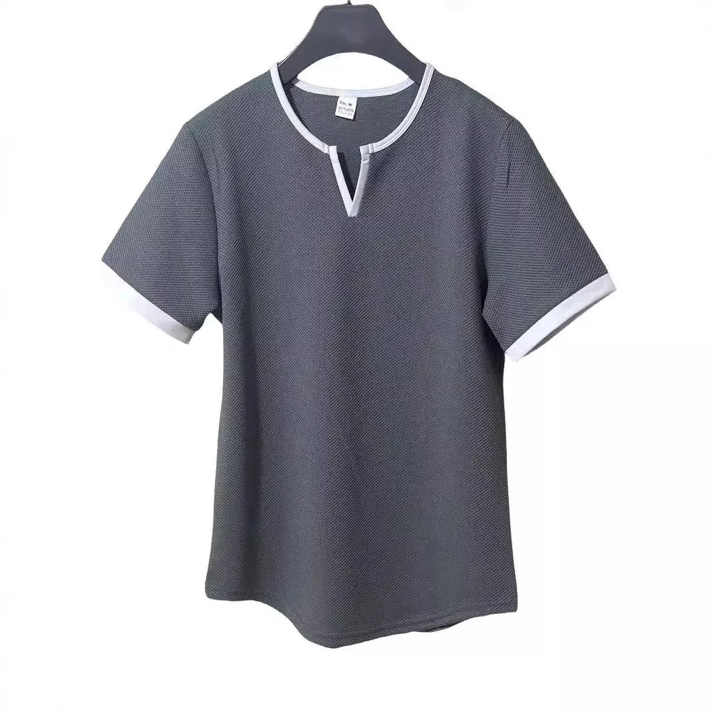 Colour-block V-neck sports t-shirt in waffle-knit polyester fabric on a hanger.