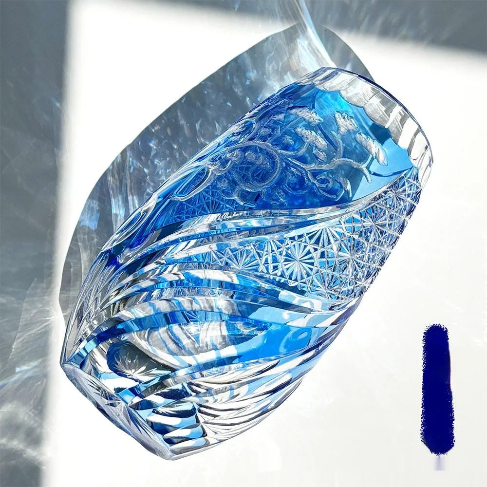 Blue Jianghu cut crystal glass tumbler 80x190mm on a table