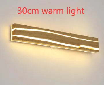 Solid wood bedroom LED wall light in log colour with rubber wood and acrylic construction