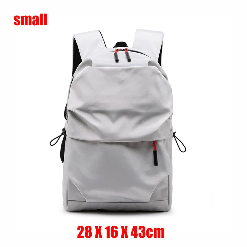 Durable nylon backpack in black and light grey with adjustable straps