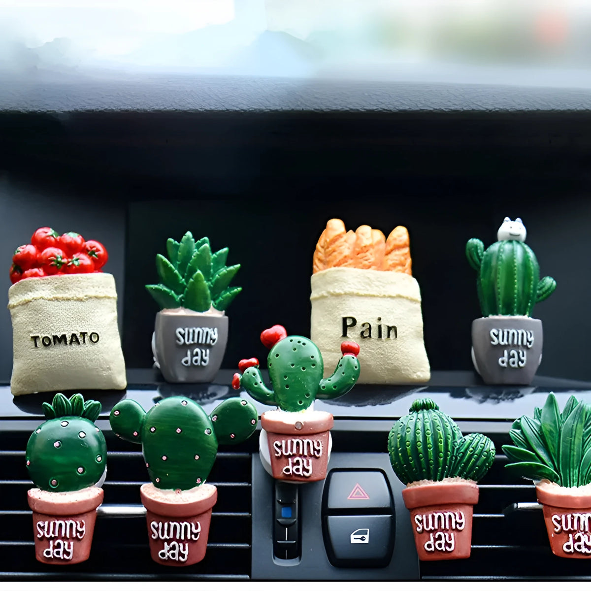Car air freshener vent clip in plant ornament style, attached to car air conditioning vent