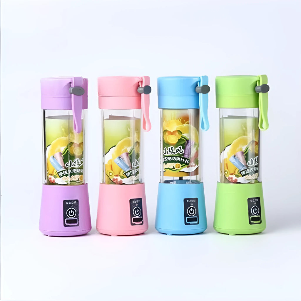 Mini USB-powered handheld fruit juicer with green plastic housing and a stainless steel blade.